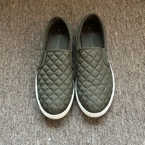 Olive green slip on sneakers